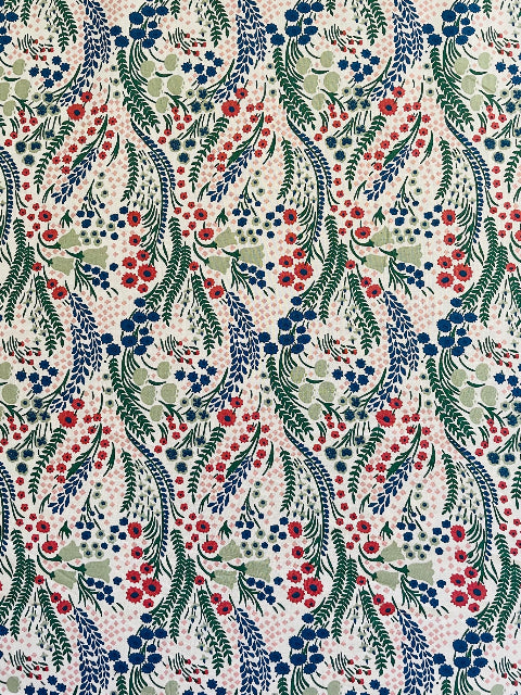 Floral pattern with red, blue, and green flowers on a beige background
