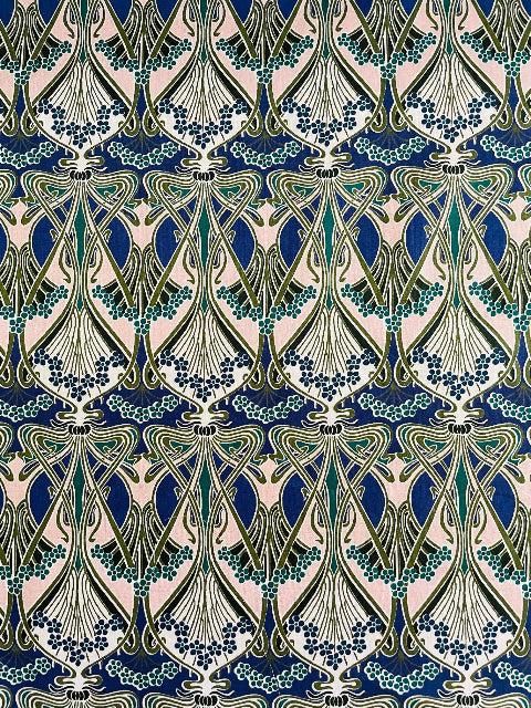Decorative pattern with abstract shapes and blue accents on a pink background