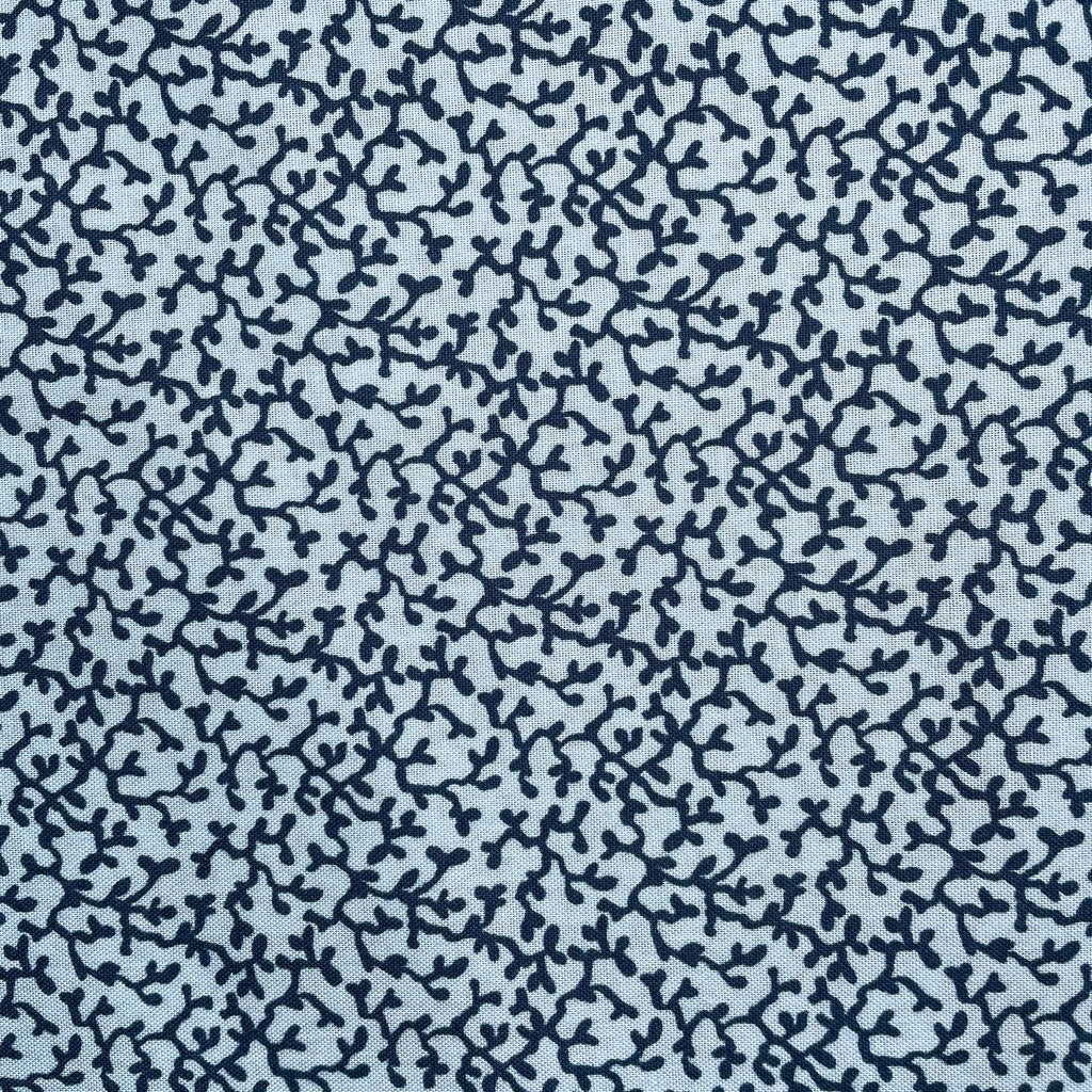 Navy blue branch pattern on a light blue background