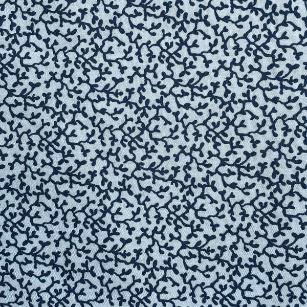 Navy blue branch pattern on a light blue background